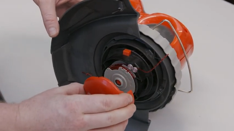 How to Replace the Spool Cover on a Flymo Trimmer