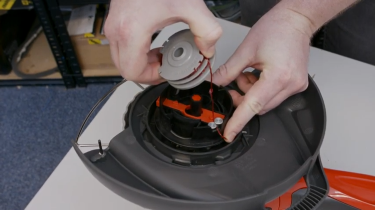 How to Replace the Manual Line Feeder on a Flymo Grass Trimmer