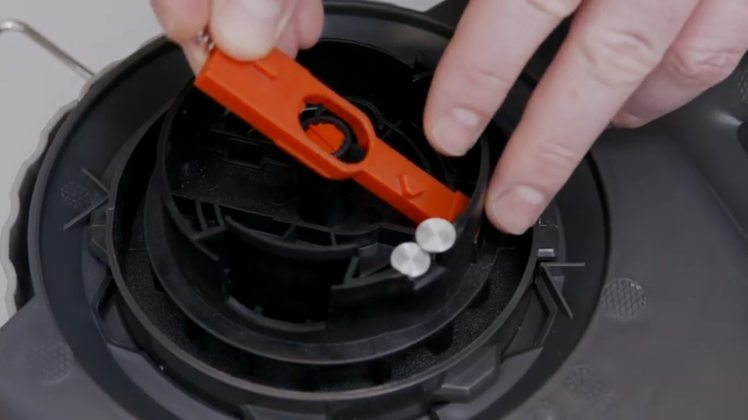 How to Replace the Manual Line Feeder on a Flymo Grass Trimmer