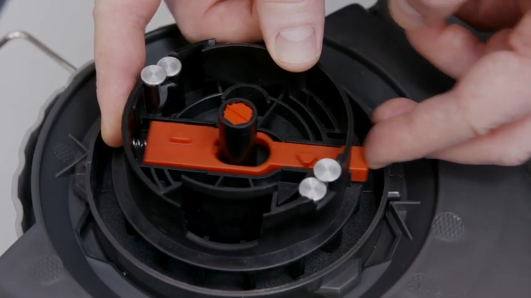 How to Replace the Manual Line Feeder on a Flymo Grass Trimmer